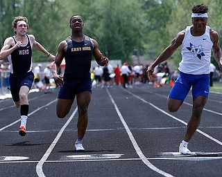 AUSTINTOWN, OHIO - May 24, 2019: Track & Field  D2 Region at Austintown-Fitch High School. .Boys 100m. Youngstown East's Giovanni Washington (middle) takes 2nd place to qualify for the state meet, Photo by MICHAEL G. TAYLOR | THE VINDICATOR