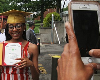 William Dlewis The vindicator Mooney grad Joclynnthompson is all smiles as she she is photogrpaphedby a friend.