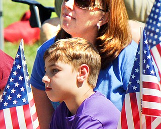 William D. Lewis The Vindicator Shannon Bray and her son Caden Brown, 10, were among a crowd of about 250 people who attended a Memorial Day ceremony in Boardman Park Monday.