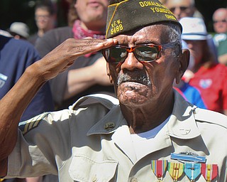 William D. Lewis The Vindicator Booker Morris of Boardman, who is a veteran and member of V.F.W. Post 5488 salutes during a Memorial Day ceremony in Boardman Park Monday.