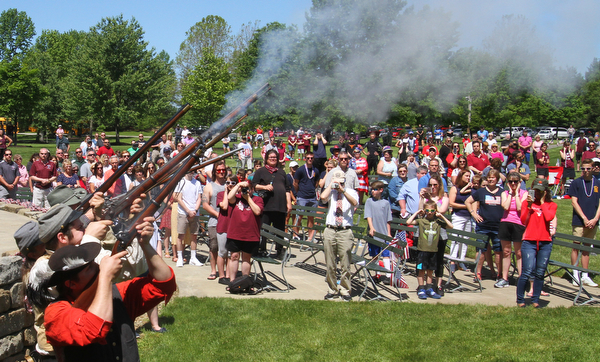 William D. Lewis The Vindicator A rifle salute was fired by Confederate Civil War reinactors led by Ron Johnson during a Memorial Day ceremony in Boardman Park Monday.