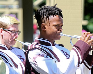 William D. Lewis The Vindicator  Boardman Band seniors Andrew Beichner, left, and Miles Spearman play taps during a Memorial Day ceremony in Boardman Park Monday.