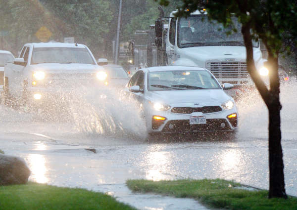 William D. Lewis The Vindicator   Heavy rains left RT224 in Poland covered with water Tuesday night.