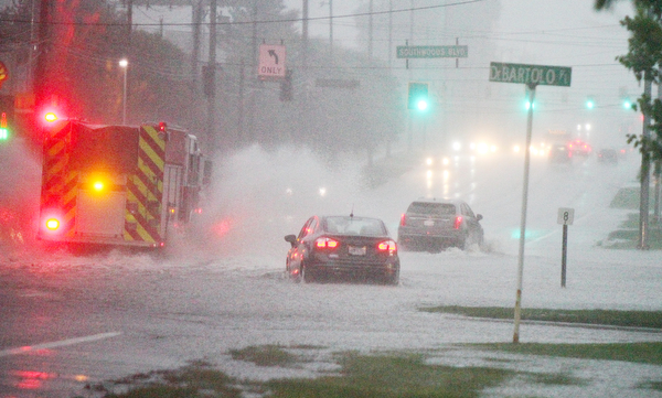 William D. Lewis The Vindicator   Heavy rains left Market St in Boardman covered with water Tuesday night.