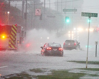 William D. Lewis The Vindicator   Heavy rains left Market St in Boardman covered with water Tuesday night.