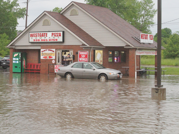 William D. Lewis The Vindicator  Picking a pizza to go was a bit of a challenge at Westgate Pizza at corner of Glenwood and Western Reserve in Boardman Tuesday night.