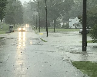 Heavy rain flooded out a portion of Callahan Road in Canfield Township on Tuesday evening.