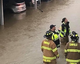 Cardinal Joint Fire District was involved in many rescue efforts Tuesday night,
One such rescue was in Indian Run Apartments where safety personnel were using rafts to get to people trapped in basement apartments.