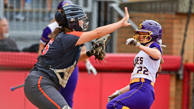 Carli Swipas of Champion High School scores a run in the second inning of the Division III semifinal game Thursday against Byesville Meadowbrook at Firestone Stadium in Akron. The Flashes won 10-0.
