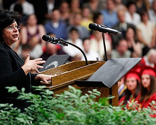Jeanne Mosure, Vice President of MS Consultants, Inc and Executive in Residence of Williamson College of Business Administration at YSU gives the commencement address during the Canfield High School commencement ceremony in Canfield High School on Friday evening. EMILY MATTHEWS | THE VINDICATOR