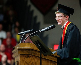 Canfield senior Gregory Halley gives the class address during the Canfield High School commencement ceremony in Canfield High School on Friday evening. EMILY MATTHEWS | THE VINDICATOR