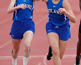 COLUMBUS, OHIO - May 31, 2019: OHSAA Track & Field Championships at Jesse Owens Stadium, Ohio State University. .D2 Girl's 4x200m relay. Poland's Chloe Kosco takes the baton fomr Ava Izenour. Poland qualified for the final. Photo by MICHAEL G. TAYLOR | THE VINDICATOR