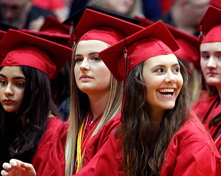 Canfield High School senior Aidyn Jones smiles up at her parents during the commencement ceremony at the high school Friday evening. 
