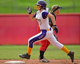AKRON, OHIO - JUNE 1, 2019: Champion's Emma Gumont runs to third for a triple in the sixth inning of the OHSAA Division III Championship game, Saturday morning at Firestone Stadium in Akron. Champion won 5-0. DAVID DERMER | THE VINDICATOR