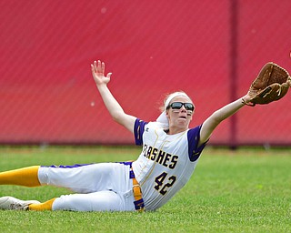 AKRON, OHIO - JUNE 1, 2019: Champion's Savannah Dodrill dives to take a hit away from Cardington-Lincoln's Paige Clinger in the seventh inning of the OHSAA Division III Championship game, Saturday morning at Firestone Stadium in Akron. Champion won 5-0. DAVID DERMER | THE VINDICATOR
