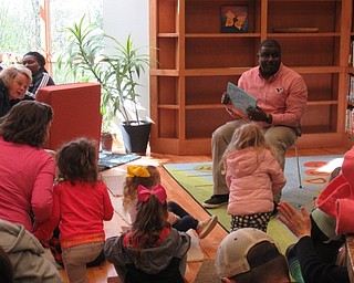 Neighbors | Jessica Harker.Youngstown Mayor Jamael Brown was one of many guests who read to children gathered at the Childrens Book Festival April 27 at Fellows Riverside Gardens.