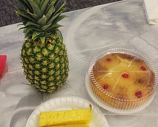 Neighbors | Abby Slanker.Canfield library celebrated Pineapple Cake Day with fresh pineapple and pineapple upside down cake on April 24.