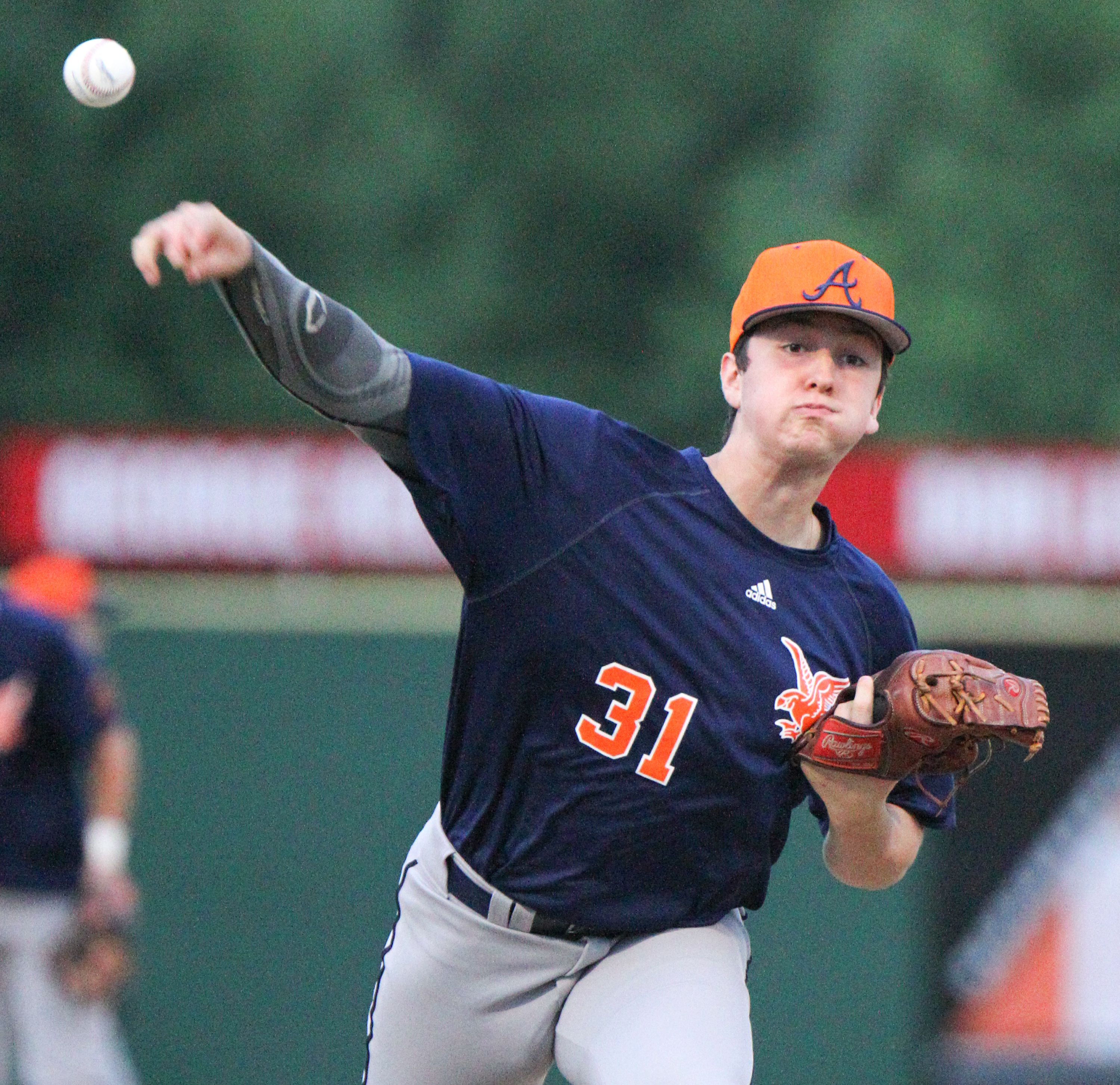 Astro Falcons pitcher Nick Cosentino makes a delivery to the plate during Tuesday night's game against DuraEdge at Cene Park in Struthers. Cosentino scattered four hits in six innings as the Falcons won 6-0.