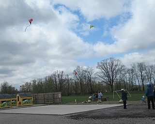 Neighbors | Jessica Harker.Community members flew kites at Austintown Park April 27 during the Kite Festival.