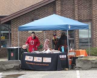 Neighbors | Jessica Harker.Representatives from Home Depot provided a craft for community members to make during the Austintown Park's Kite Festival April 28.