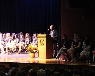 Neighbors | Abby Slanker.Chris Jennings, Canfield High School English teacher, was the guest speaker for the school’s annual National Honor Society Induction Ceremony on April 17.