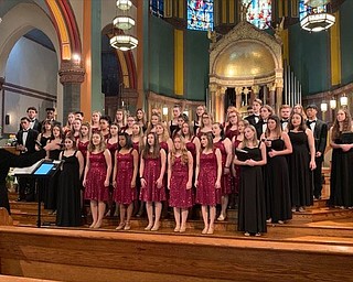 Neighbors | Submitted.Choral director Linda Smrek led the Boardman Singers and Chorale in singing the Boardman High School alma mater inside St. Paul the Apostle Church in New York City, on April 25.