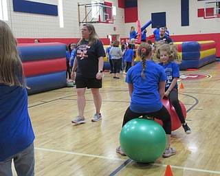 Neighbors | Jessica Harker.Fifth-graders at Austintown Intermediate School enjoyed Fun Day on May 30, keeping in doors by playing with gym equitpment in the school's gymnasium.