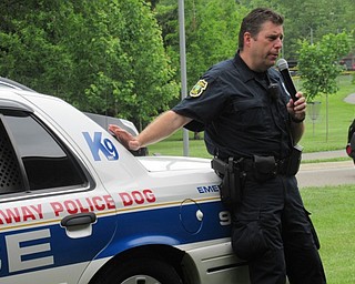 Neighbors | Jessica Harker .A representative of the Boardman Police Department K9 division attended the Boardman Park's Adopt-A-Palooza event June 2, discussing with community members the unique advantages of working with police dogs.