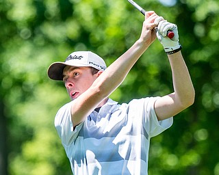 DIANNA OATRIDGE | THE VINDICATOR Jake Shingledecker, 17, from Brookfield, watches his tee shot on Hole No. 7 during the Greatest Golfer of the Valley Junior Qualifier at Pine Lakes in Hubbard on Tuesday.