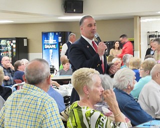 Neighbors | Jessica Harker.Austintown superintendent Vince Colaluca addressed senior community members April 24 at the Austintown Fitch High School's annual Senior Citizen Dinner.