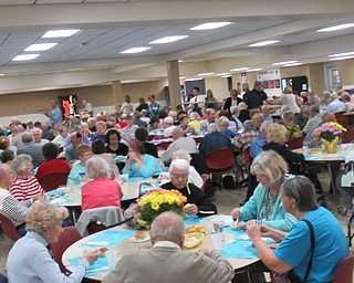 Neighbors | Jessica Harker.Community members 65 years old or over attended Austintown Fitch High School's annual Senior Citizen dinner April 24.