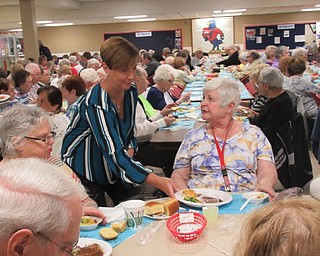 Neighbors | Jessica Harker.Austintown teachers volunteered to serve dinner to seniors April 24 during Austintown Fitch High School's annual Senior Citizen Dinner.