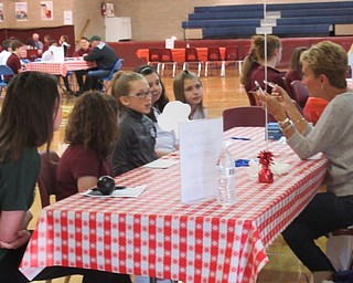 Neighbors | Jessica Harker.Local nurse Kathy Cernica spoke to students who were interested in pursuing a nursing career on May 6 at St. Christine's Career Day event. .
