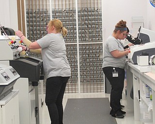 Neighbors | Jessica Harker .The new Eyemart Express on Boardman Poland Road has it's own fully functional lab located in the back of the store, a unique feature for eye glass providers.