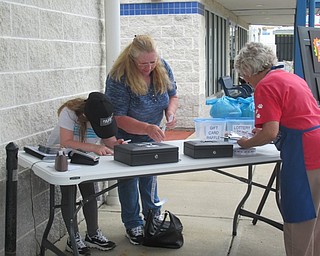 Neighbors | Jessica Harker.Along with dinner community members were able to enter their names into a gift card raffle or lottery ticket raffle May 3 at Angels for Animals Lasagna Dinner fundraiser.
