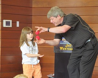 Neighbors | Jessica Harker .Magician Jeff Wawrzaszek asked for volunteers to help him during his magic show.