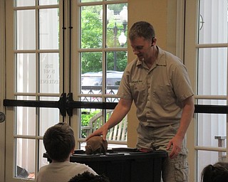 Neighbors | Jessica Harker .The Poland library hosted Outback Ray and his Amazing Animal Show June 6, where Ray showed off his armadillo, which he said is the only one in a private collection in Ohio.