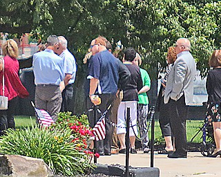 Admirers of Phil Annarella, Fitch High school head football coach, line up for his calling hours — a six-hour observance — at the school. Annarella, 70, died on June 8 of natural causes. His funeral will be 10 a.m. Saturday in St. Stephen Church in Niles.