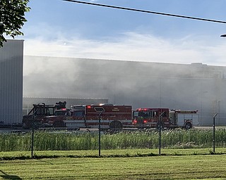 Fire departments from North Jackson, Lordstown and Ellsworth are on the scene of a fire at Universal Stainless’ local plant. Smoke can be seen enveloping the facility. 