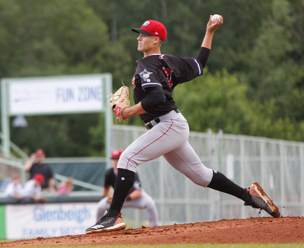 The Muckdogs' Eli Villalobos pitches during their game against the Scrappers at Eastwood Field on Sunday evening. EMILY MATTHEWS | THE VINDICATOR