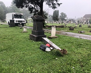 Cleanup is ongoing in Brookfield Township Cemetery, just one area affected by Sunday night's storm that also hit Warren, Howland, Southington and Howland. 