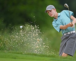 BOARDMAN, OHIO - JUNE 18, 2019: Alex Landry, of Andover, Massachusetts, shoots out of the bunker on on the 17th hole, Tuesday afternoon at Mill Creek Golf Course during he first round of the American Junior Golf Association Tournament. DAVID DERMER | THE VINDICATOR