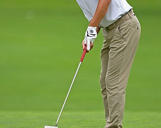 BOARDMAN, OHIO - JUNE 18, 2019: Neil Zhu, of Novi, Michigan, follows his putt on the 16th hole, Tuesday afternoon at Mill Creek Golf Course during he first round of the American Junior Golf Association Tournament. DAVID DERMER | THE VINDICATOR