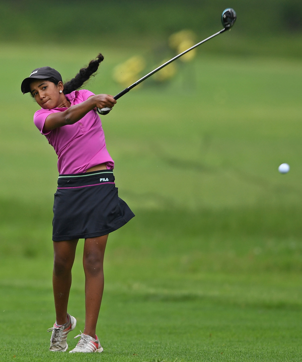 BOARDMAN, OHIO - JUNE 18, 2019: Sophia Sulkar, of Barrington Hills, Illinois, watches her approach shot on the 10th hole, Tuesday afternoon at Mill Creek Golf Course during he first round of the American Junior Golf Association Tournament. DAVID DERMER | THE VINDICATOR