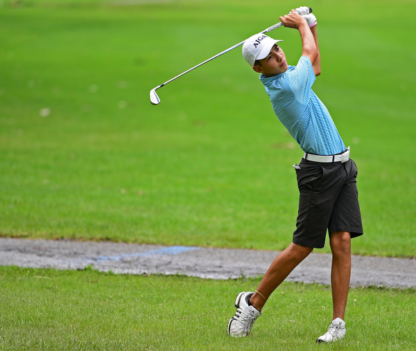 BOARDMAN, OHIO - JUNE 18, 2019: Andres Barraza, of Parkland, Florida, watches his approach shot on the ninth hole, Tuesday afternoon at Mill Creek Golf Course during he first round of the American Junior Golf Association Tournament. DAVID DERMER | THE VINDICATOR