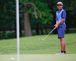 Dhruv Kumar, of Novi, Michigan, reacts after putting the ball during the second round of the Mahoning Valley Hospital Foundation Junior All-Star AJGA tournament at Mill Creek Golf Course on Wednesday. EMILY MATTHEWS | THE VINDICATOR