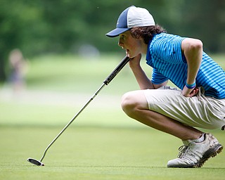 Patrick O'Leary, of Beverly Hills, Michigan, looks to line up his ball with the hole during the second round of the Mahoning Valley Hospital Foundation Junior All-Star AJGA tournament at Mill Creek Golf Course on Wednesday. EMILY MATTHEWS | THE VINDICATOR