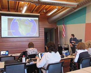 Neighbors | Jessica Harker.Librarian Hannah Matulek organized the Explore the Globe with Google Earth event on April 23 at the Michael Kusalaba library to celebrate Earth Day.