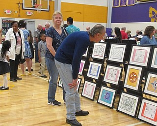 Neighbors | Jessica Harker.St. Christine's student art work was on display in the gym May 3 during the schools annual Grandparents Day, where students and grandparents had the opportunity to purchase the students framed art pieces.