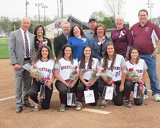 Neighbors | Jessica Harker.Senior softball players, from left, Alicia Saxton, Ashley Saxton, Vanessa Roush, Brooke Hoffman and Jennifer Taraszewski posed with their families during the team's annual senior night on April 29.